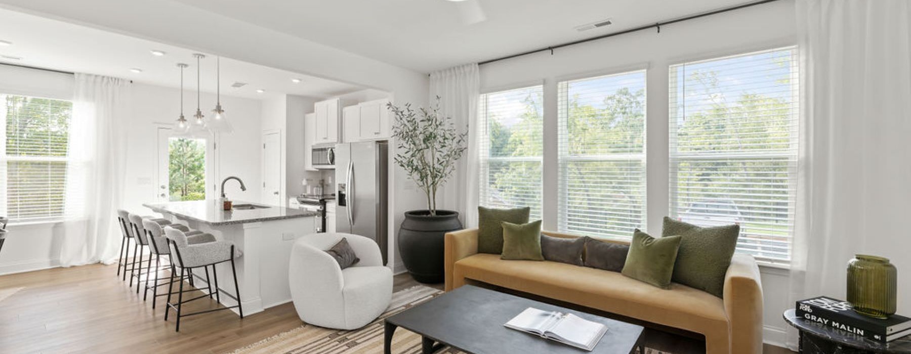 Open space living area with natural lighting